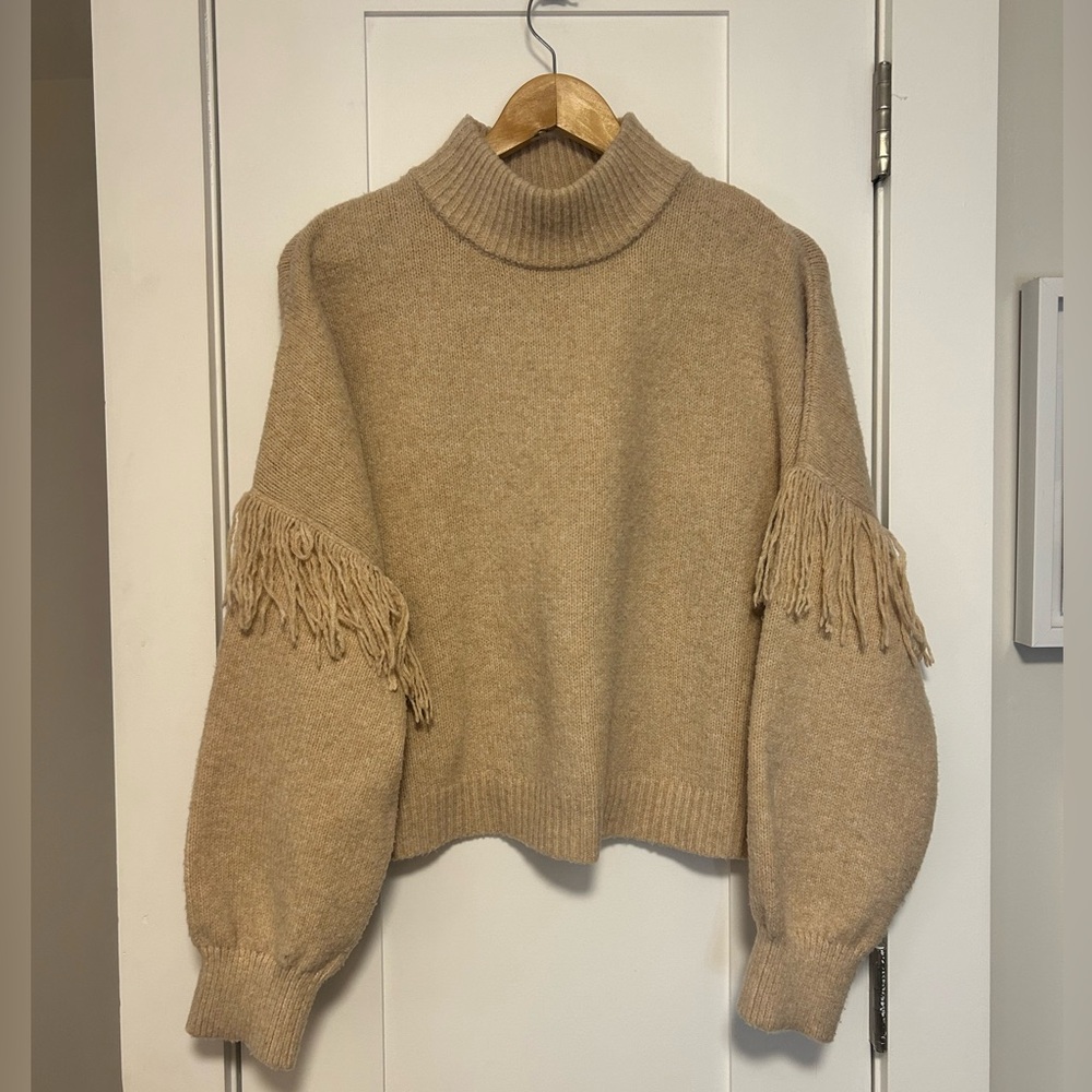 Elegant Tan Turtleneck Sweater with Fringe